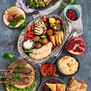 Arabic food assortment on dark background. Traditional food concept. Top view, flat lay