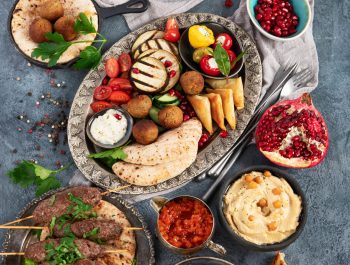 Arabic food assortment on dark background. Traditional food concept. Top view, flat lay